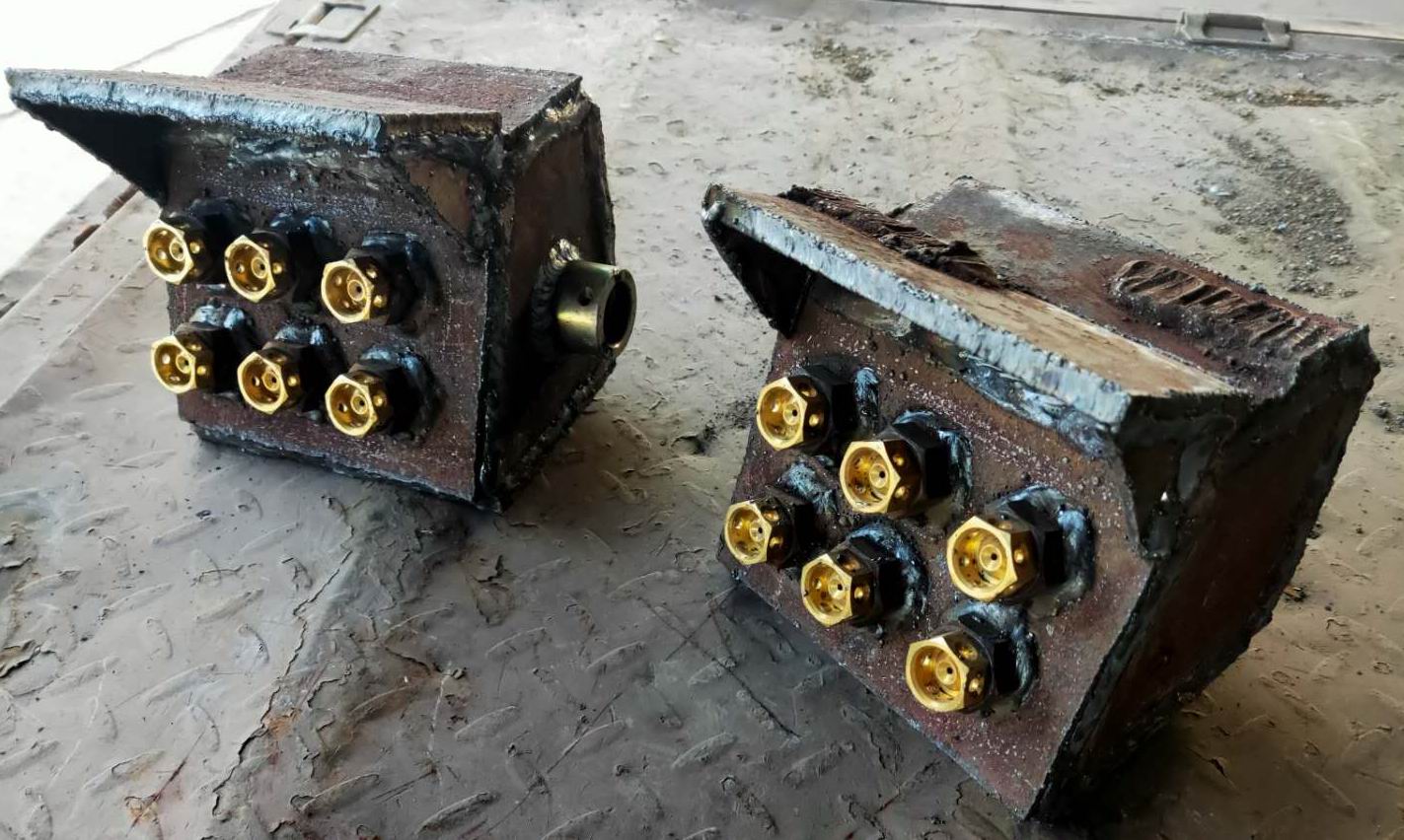 1604976582363256.jpg 2020年11月6日,朱家峁煤矿设计制作采煤机喷雾“神器”效果好(王忠磊摄).jpg